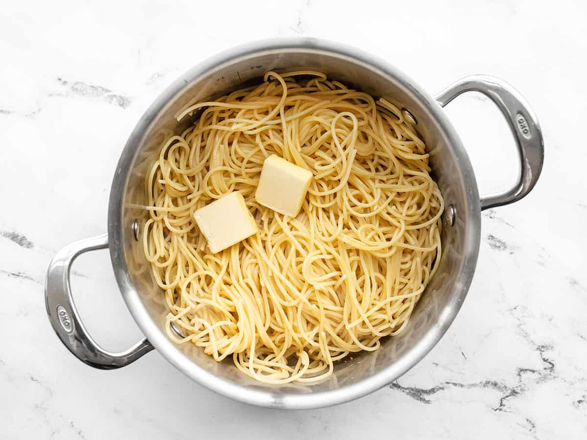 Drained pasta and butter added back to the pot.