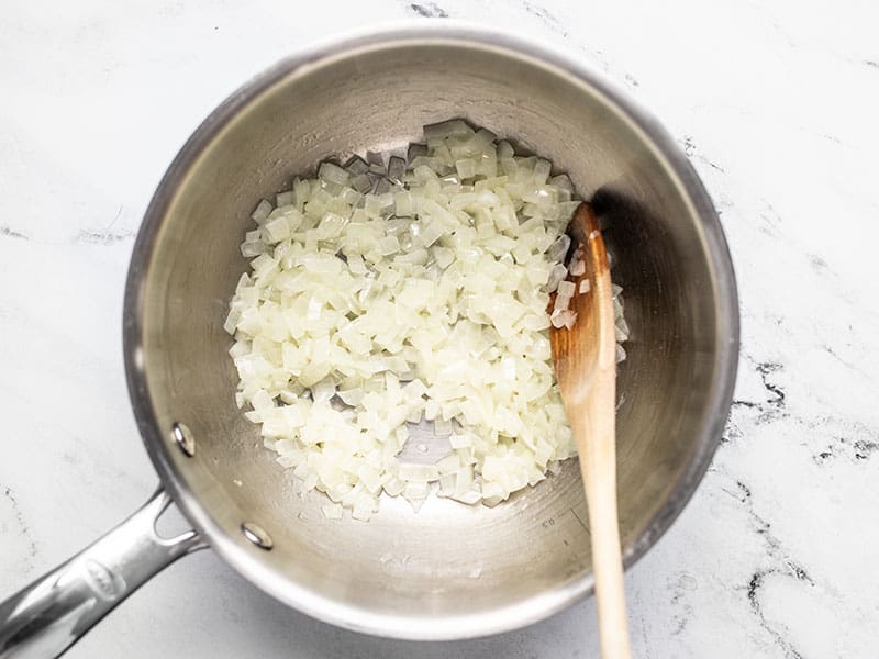 Sautéed onion in butter in sauce pot.