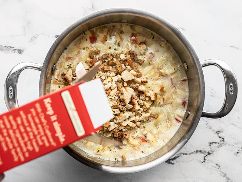 Stuffing mix being added to boiling water