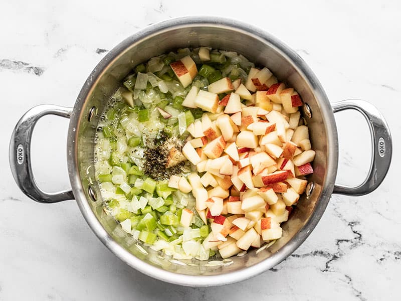 Add diced apples and sage to pot