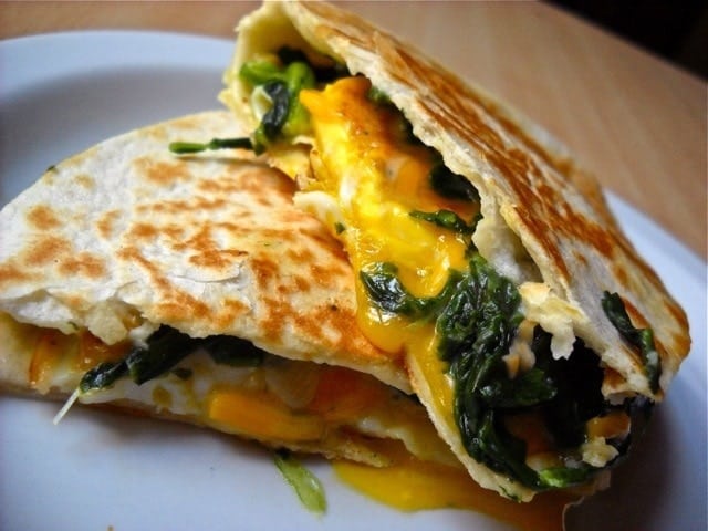 Eggs Florentine quesadilla served displayed on a plate.