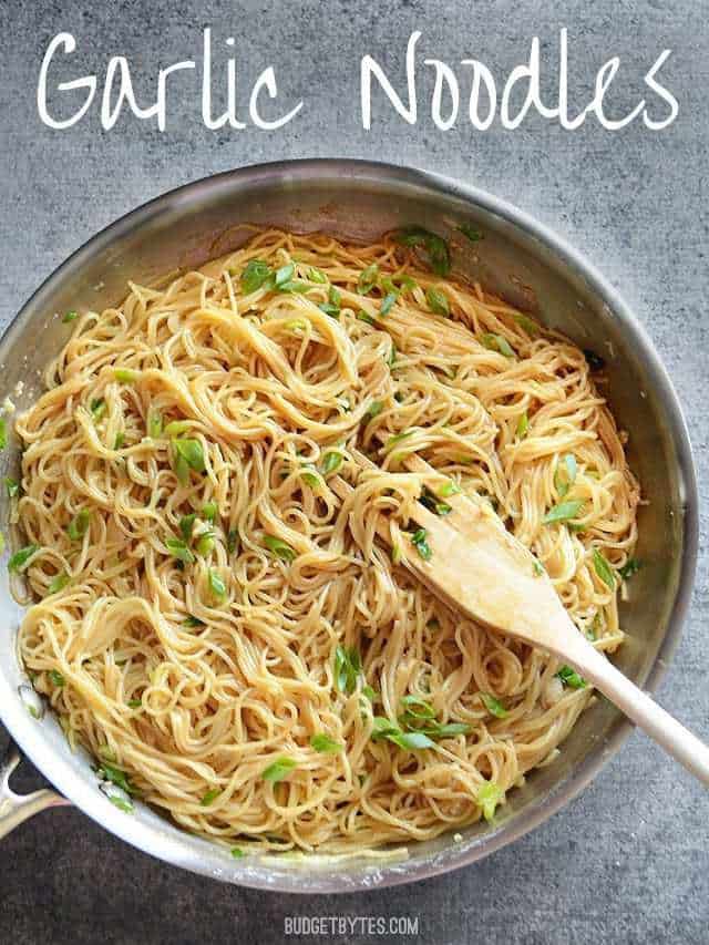 Garlic Noodles in the skillet topped with green onion