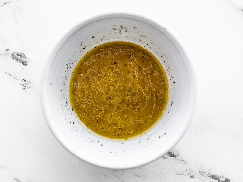 lemon garlic dressing in a small bowl