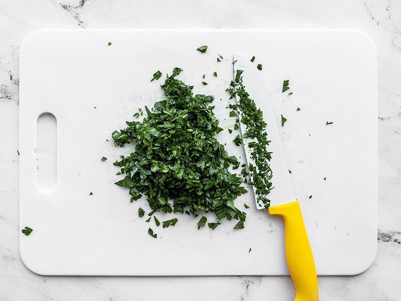 Chopped parsley on a cutting board