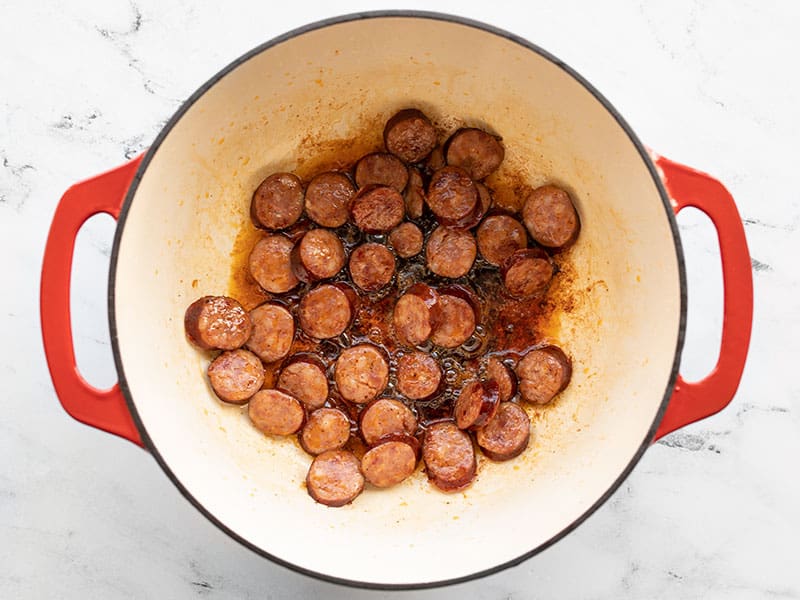 Browned sausage in pot