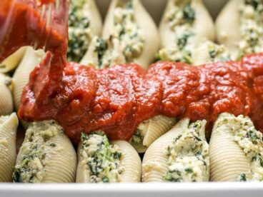 Pour Pasta Sauce Over Pesto Stuffed Shells