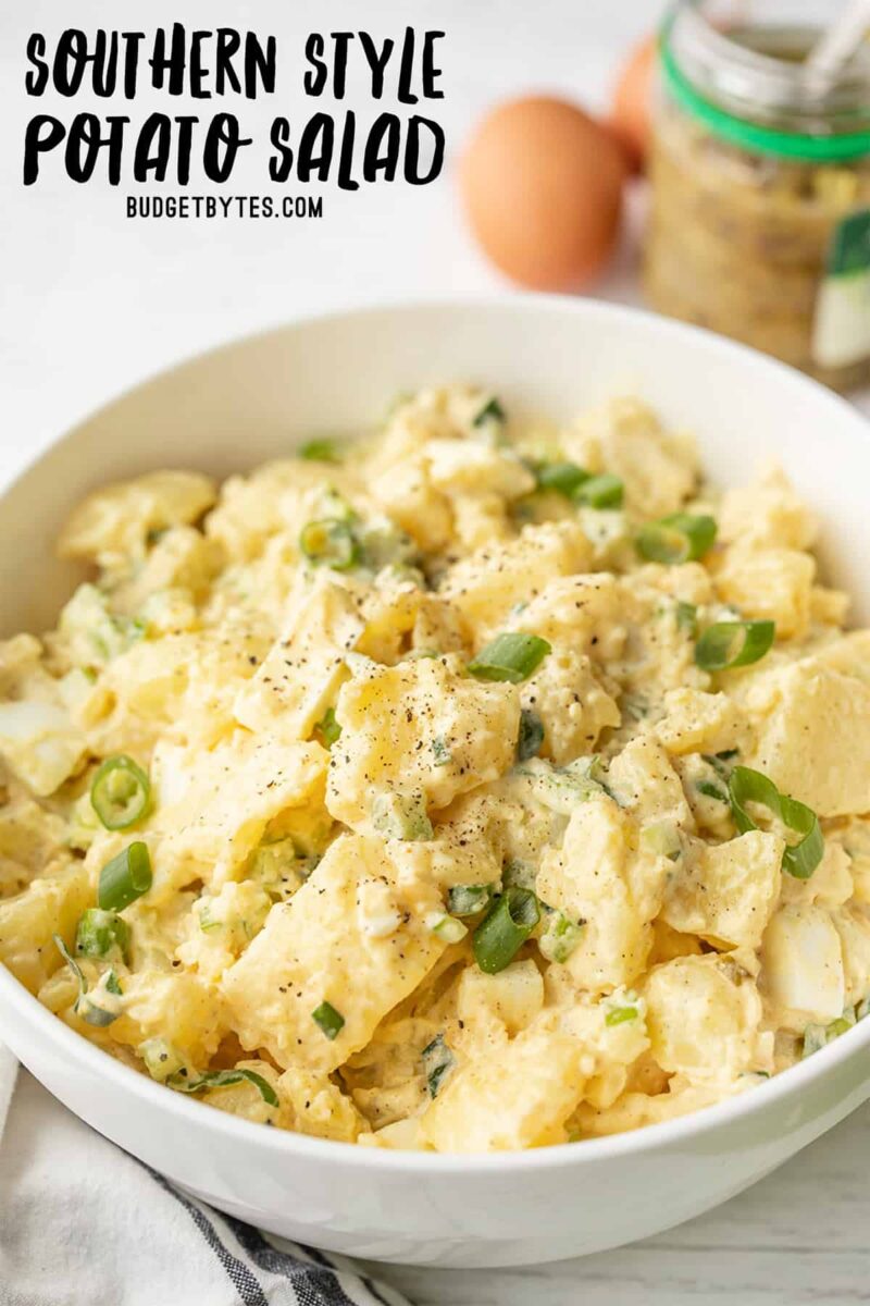 side view of a bowl full of potato salad with title text at the top