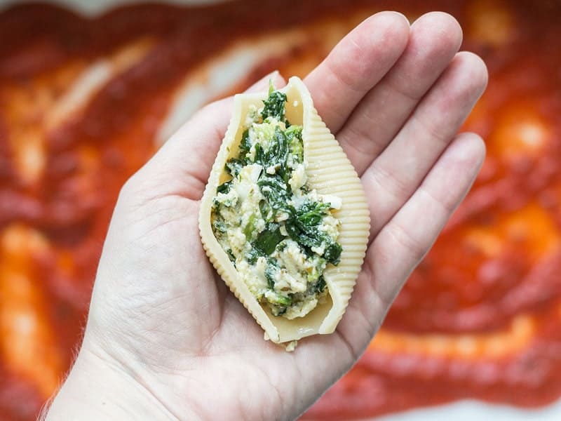 Stuff Jumbo Shells with pesto spinach ricotta filling