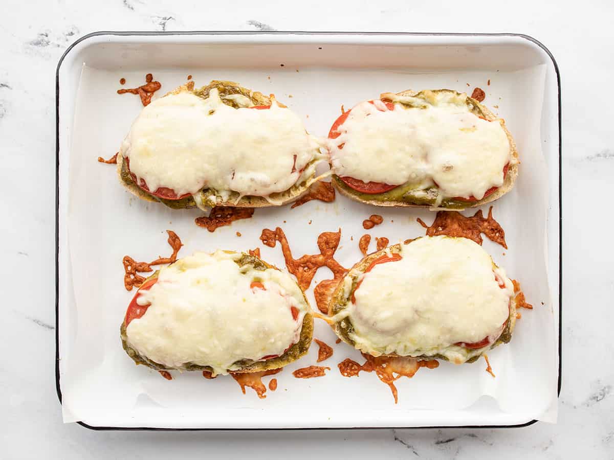 baked pesto cheese toast on the baking sheet