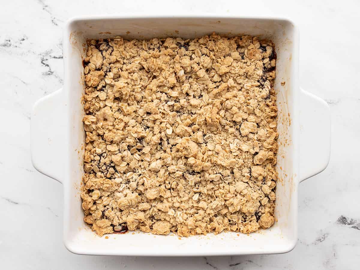 baked raspberry oat bars in the baking dish