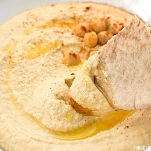 Homemade hummus is quick, easy, and inexpensive, and can be made with several different flavor add-ins. Here are four delicious flavors to try. BudgetBytes.com