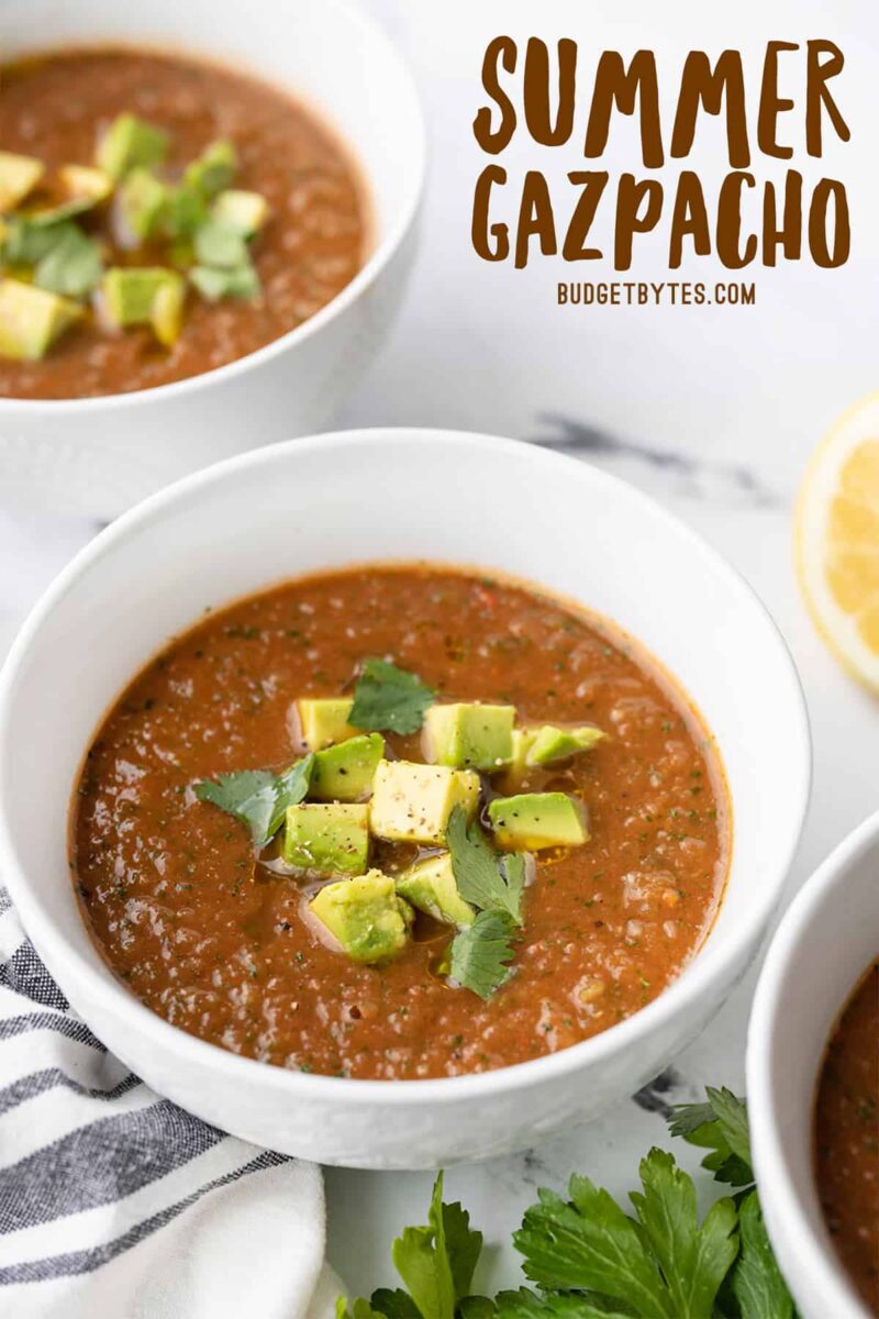 three bowls of summer gazpacho with title text at the top