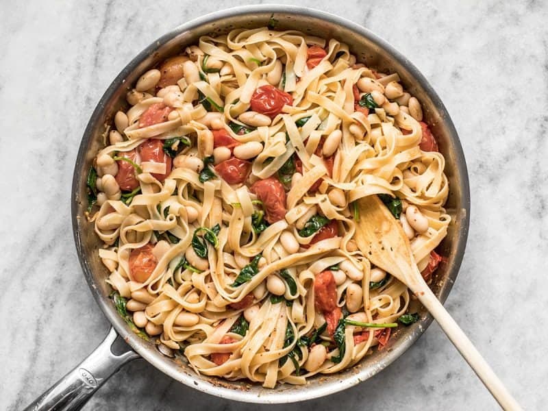 Cooked and drained pasta added to the skillet