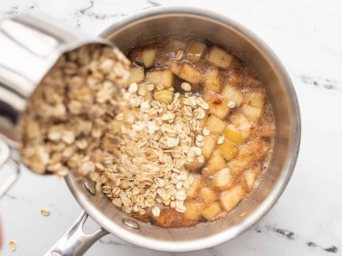 oats being poured into the pot