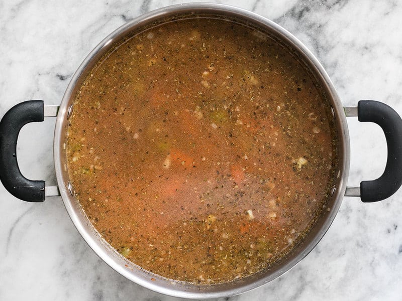 Broth added to Lentil & Sausage Stew in pot of other ingredients 