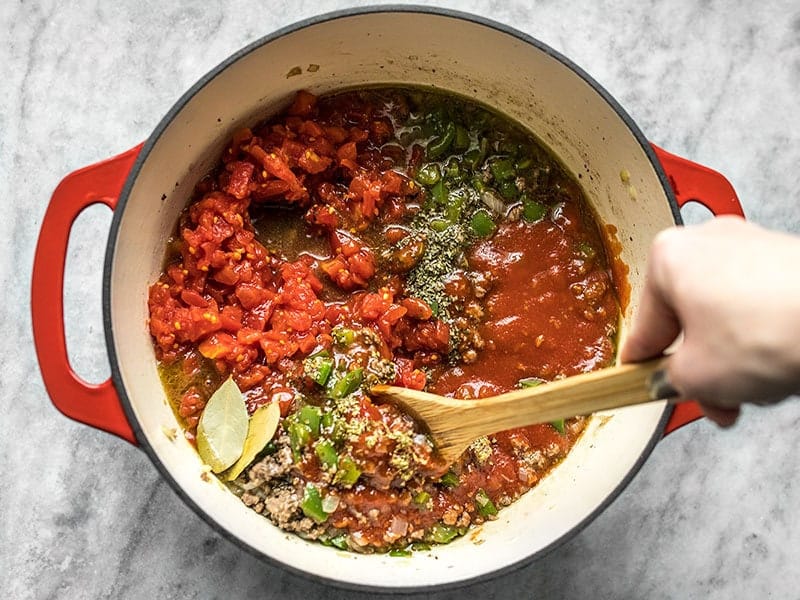 Add Tomatoes and Seasoning then Stir to Combine