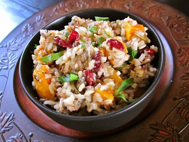 Angle view of holiday rice pilaf in a bowl.