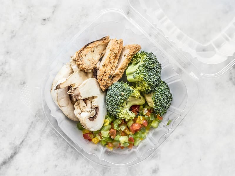 Pizza Toppings from Salad Bar in plastic take out container