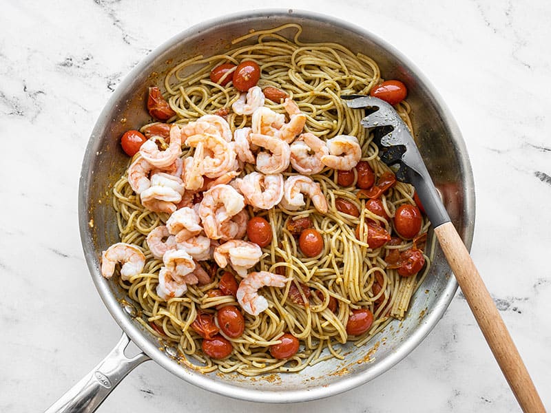 Cooked shrimp added to the pasta