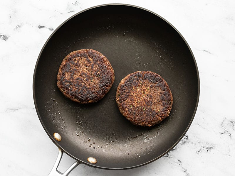 Black bean burgers in a skillet