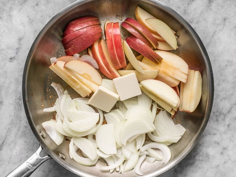 Add Apples Onions and Butter to skillet