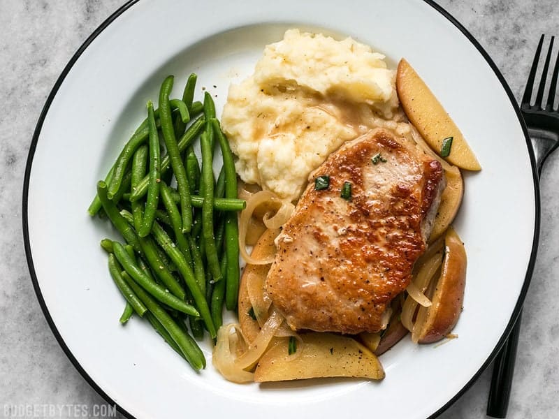 Apple Spice Pork Chops, Instant Pot Mashed Potatoes, and green beans on a plate