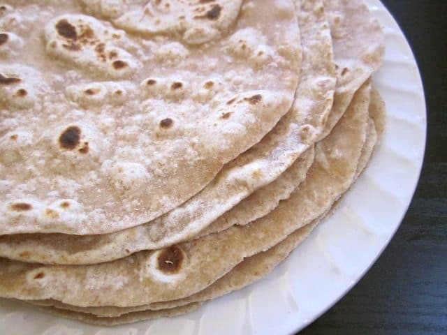 Homemade tortillas on a plate.