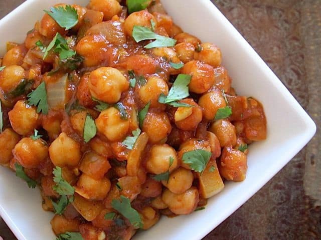 Close-up of chana masala displayed from above.