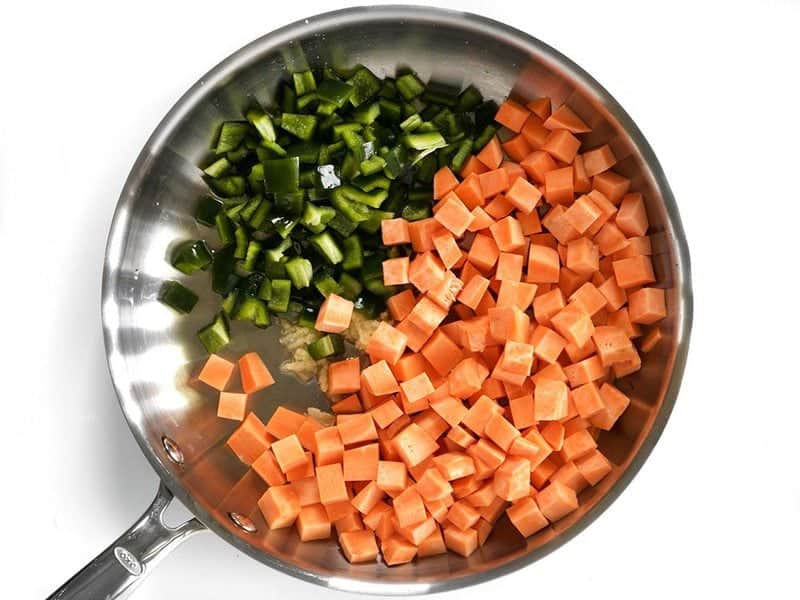 Diced Sweet Potato Poblano and Garlic in the skillet