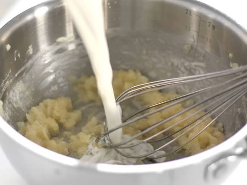 Whisk in Milk to roux mixture 