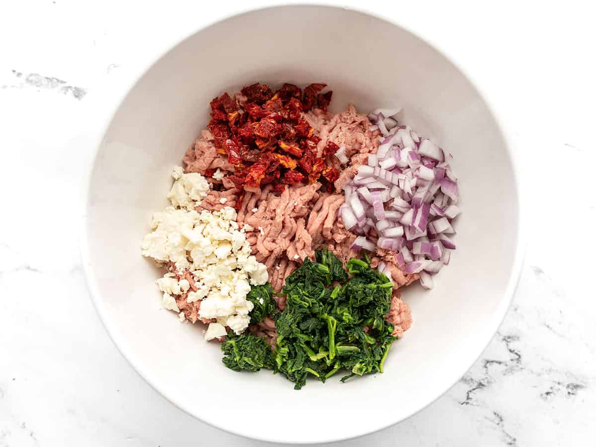 Ground turkey and burger add-ins in a bowl