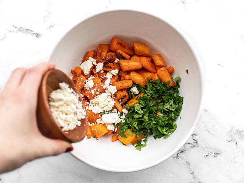 Carrots parsley and feta in a bowl