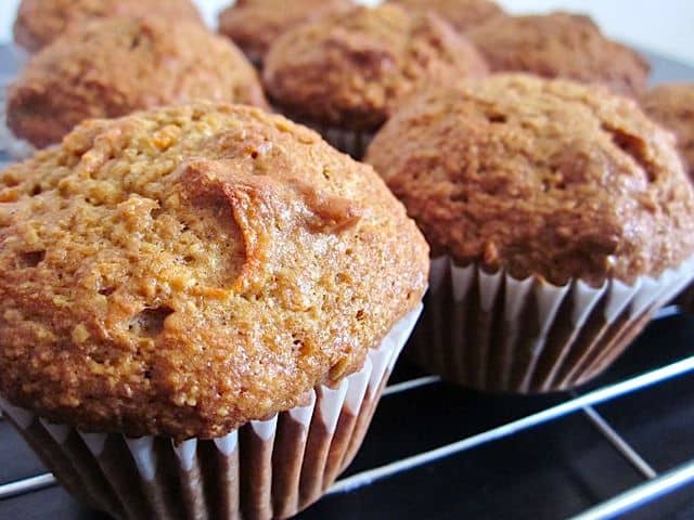 Array of muffins in a decorative display.