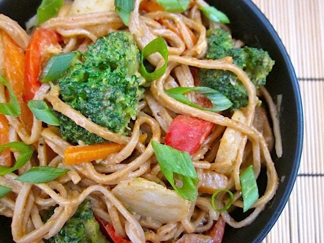 Soba noodles with peanut sauce close-up.