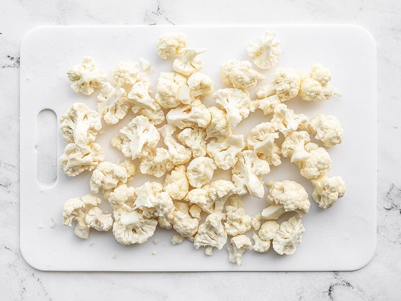 Chopped cauliflower on a cutting board