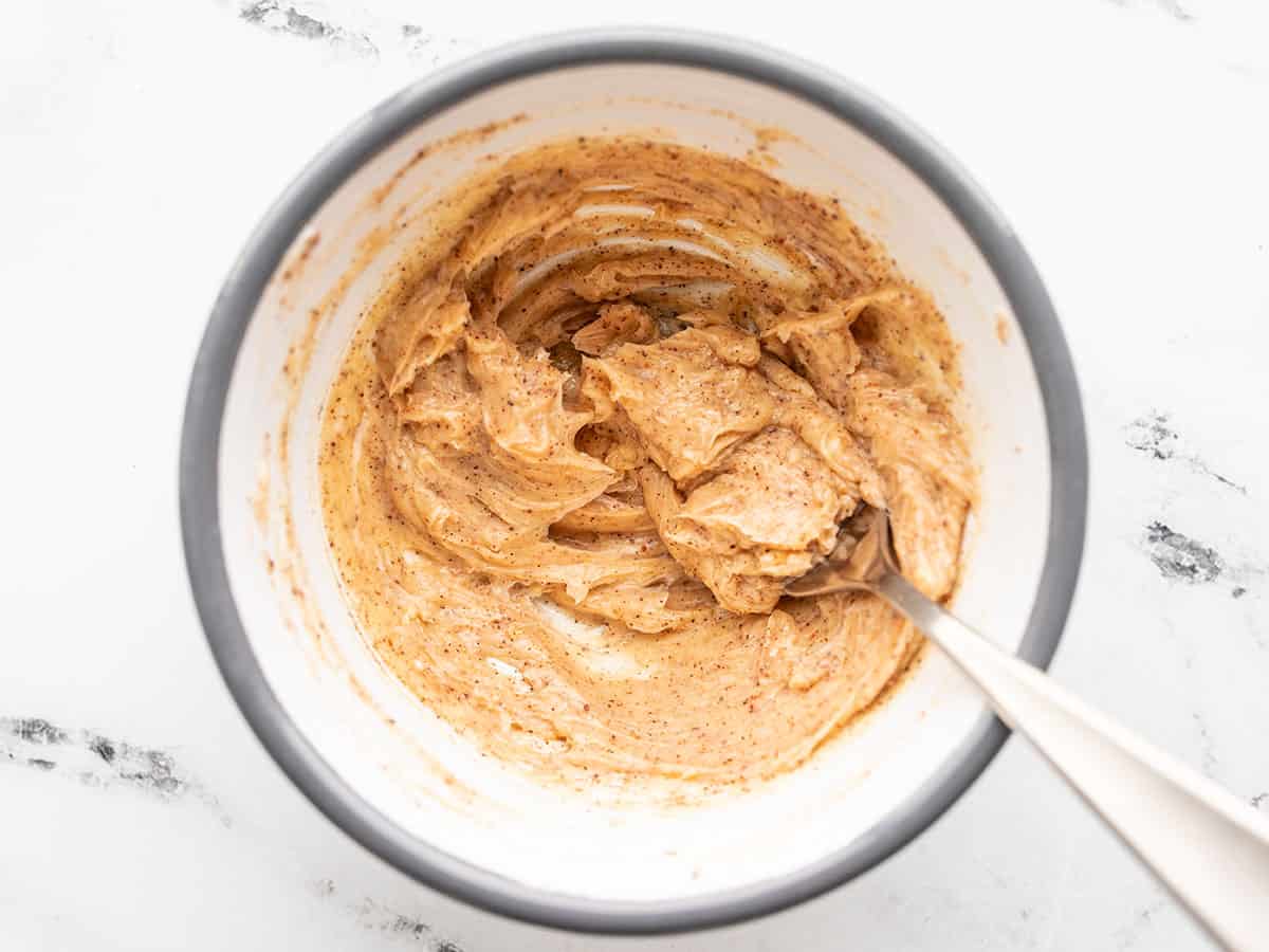 Prepared honey chili butter in a bowl with a fork