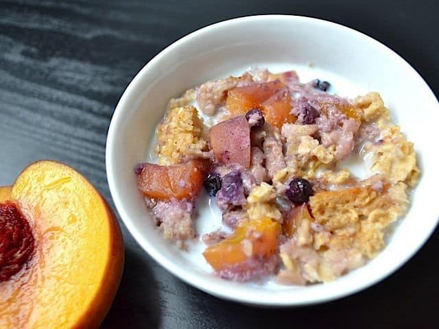 Close-up of baked oatmeal topped with fruits.