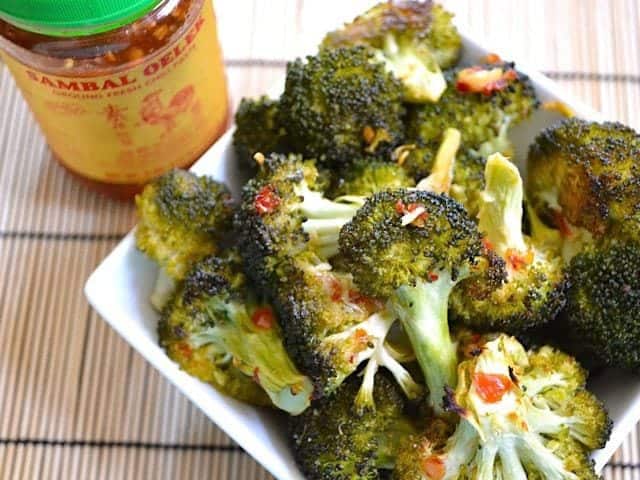 Close-up of broccoli sambal with vibrant seasoning.