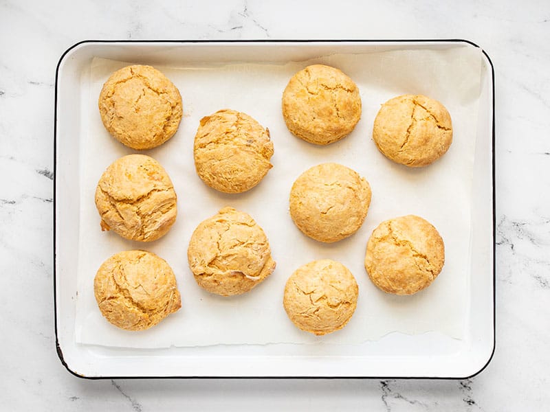 Baked sweet potato biscuits on a baking sheet