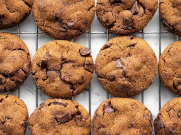 close up of chocolate molasses cookies on a cooling rack