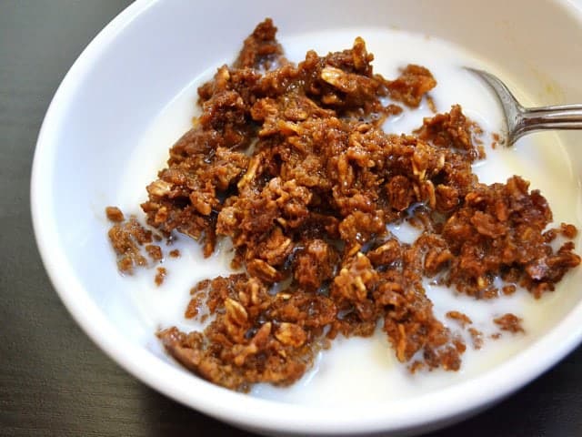 Gingerbread baked oatmeal served in a bowl with milk.