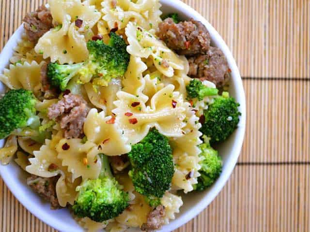 Close-up of spicy sausage pasta served in a bowl.