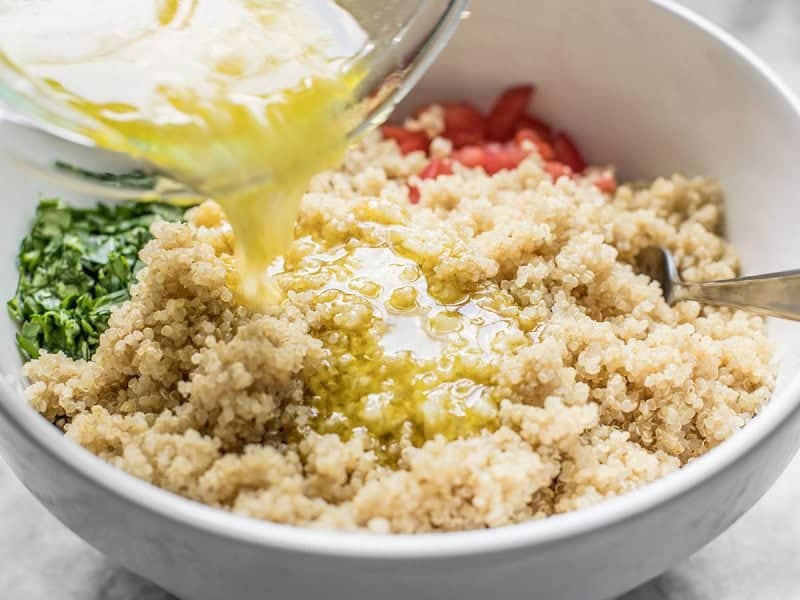 Add Dressing to Quinoa Tabbouleh