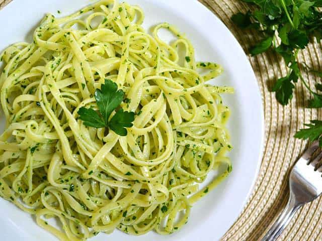 Close-up of parsley pesto in a plate.