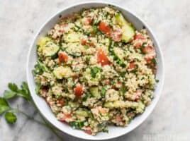 Fresh and vibrantly flavored, this Quinoa Tabbouleh has all the familiar flavors of traditional tabbouleh, but with easy to cook and nutrient rich quinoa instead of bulgur. Budgetbytes.com