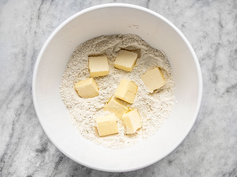 Add Butter to Rosemary Pepper Drop Biscuits