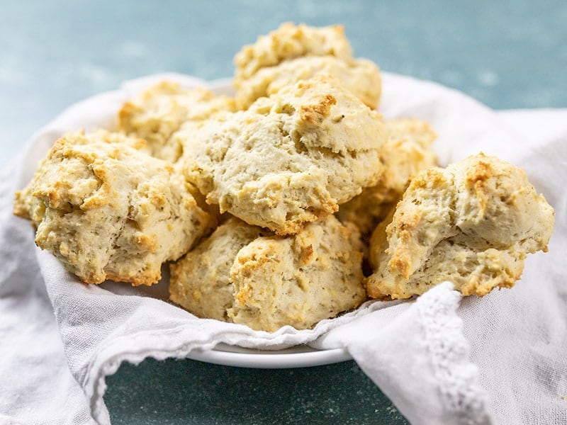 A basket full of freshly baked Rosemary Pepper Drop Biscuits