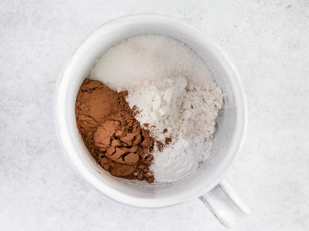 Dry ingredients for the mug cake in the mug.