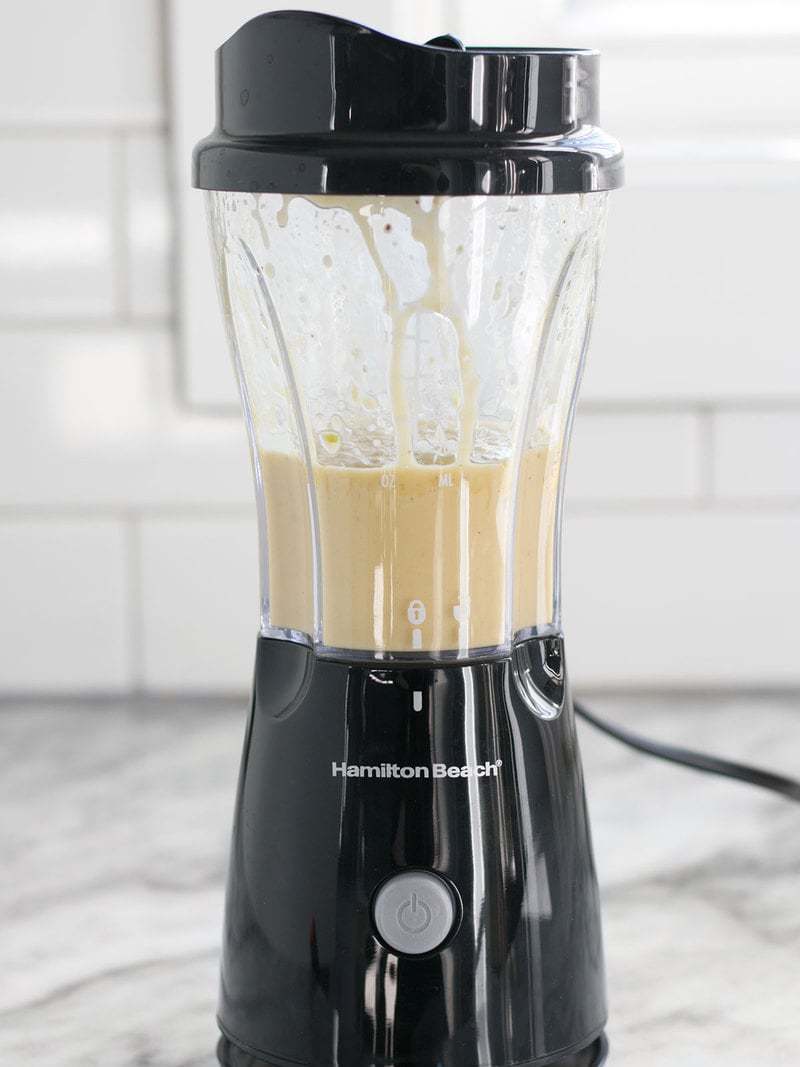 Finished Dijon Vinaigrette in the blender, viewed from the side