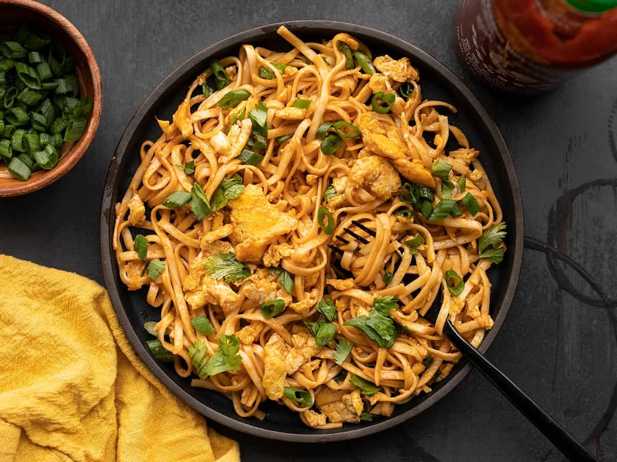 Overhead view of a plate of spicy sriracha noodles